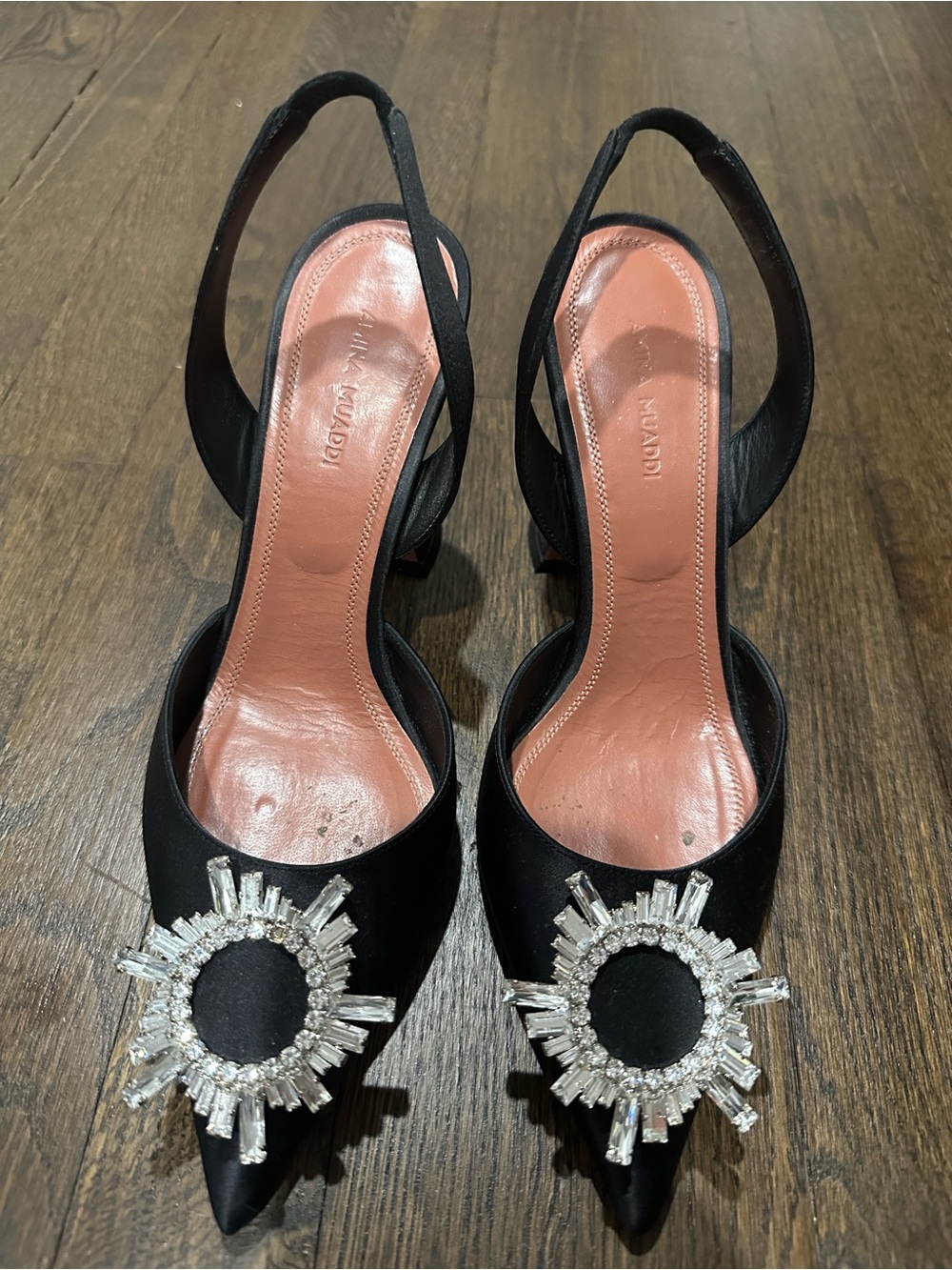 Amina Muaddi Black Satin Pointed Slingback Pumps with Crystal Sunbursts